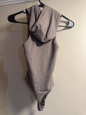 Aritzia Sleeveless Hooded Bodysuit in Taupe